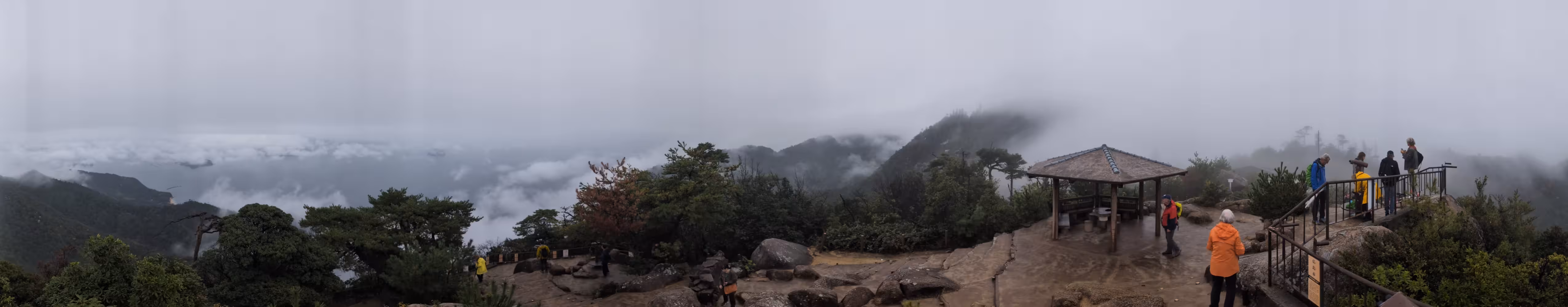 Panorama of the same. In addition there are a small wooden shelter and some people visible in the right part of the image.