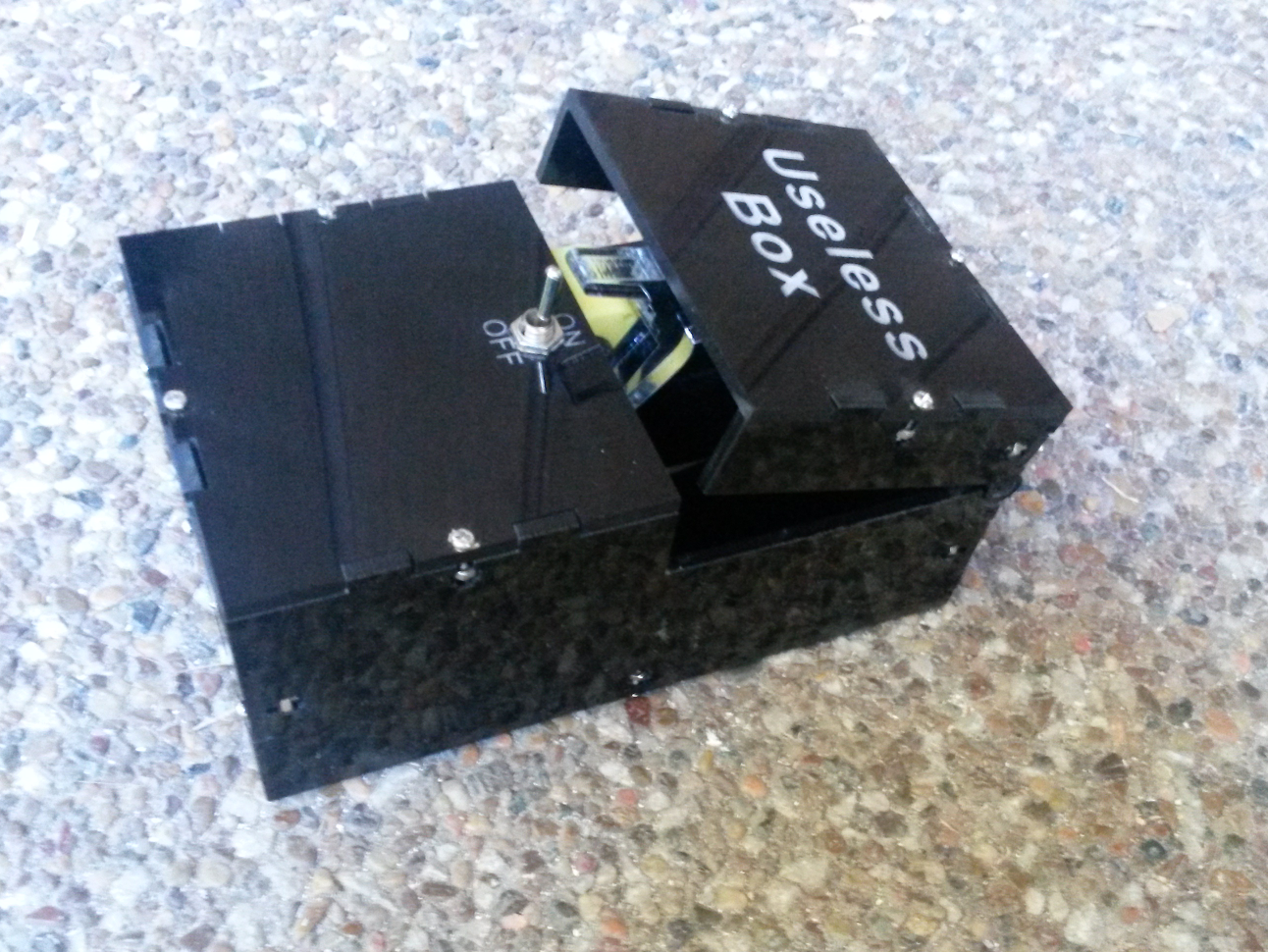 The “useless machine”, an art piece with a switch that is turned off by the machine if someone turns it on.